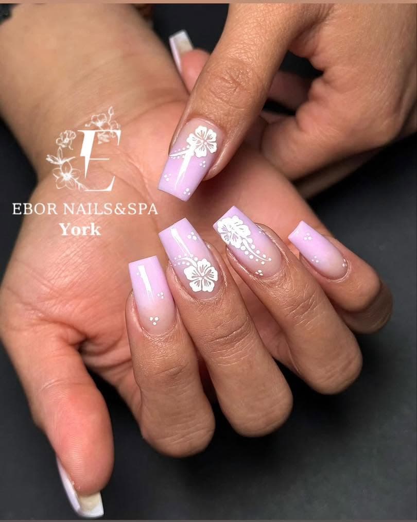 Pink ombre square nails with white hibiscus designs
