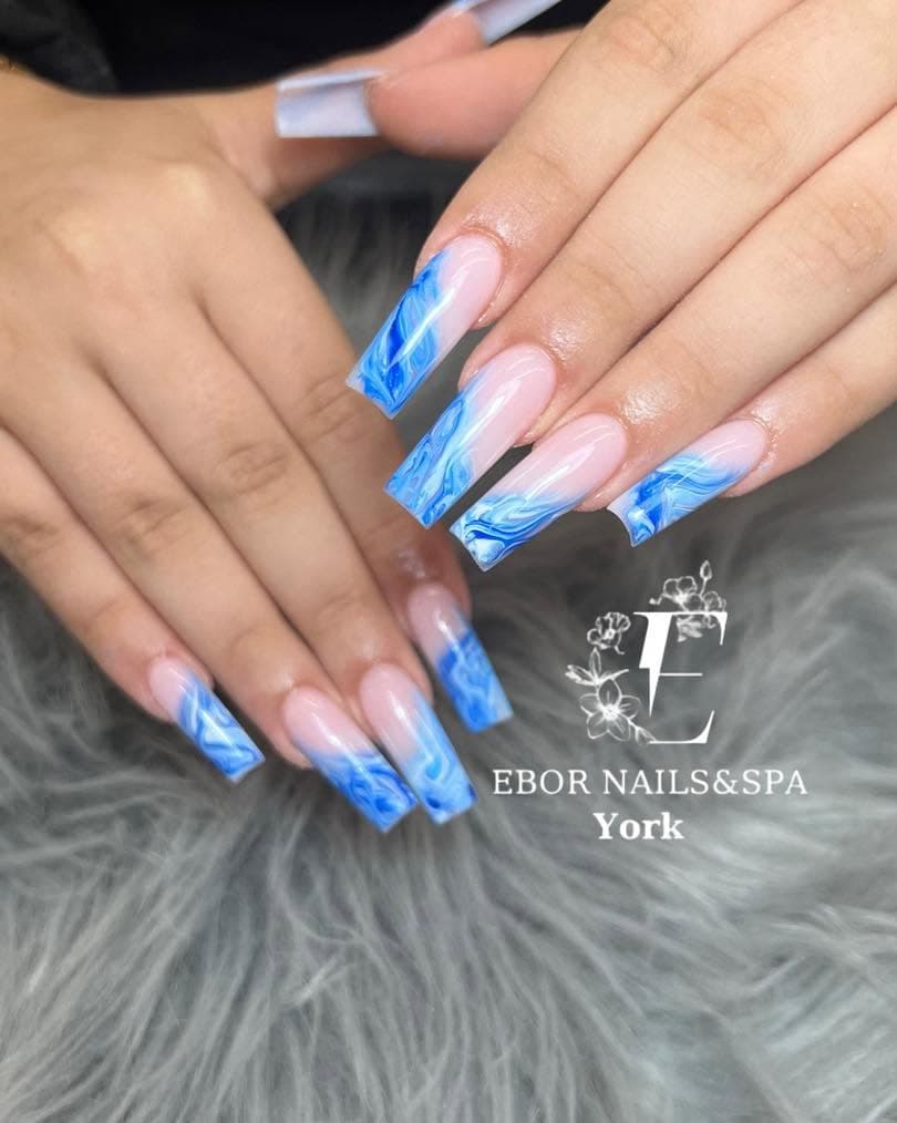 Long square nails with blue marble French tips